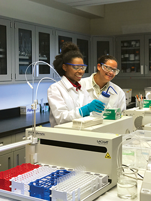 Two women working in a lab