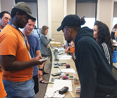 students using a calculator in a geology lab