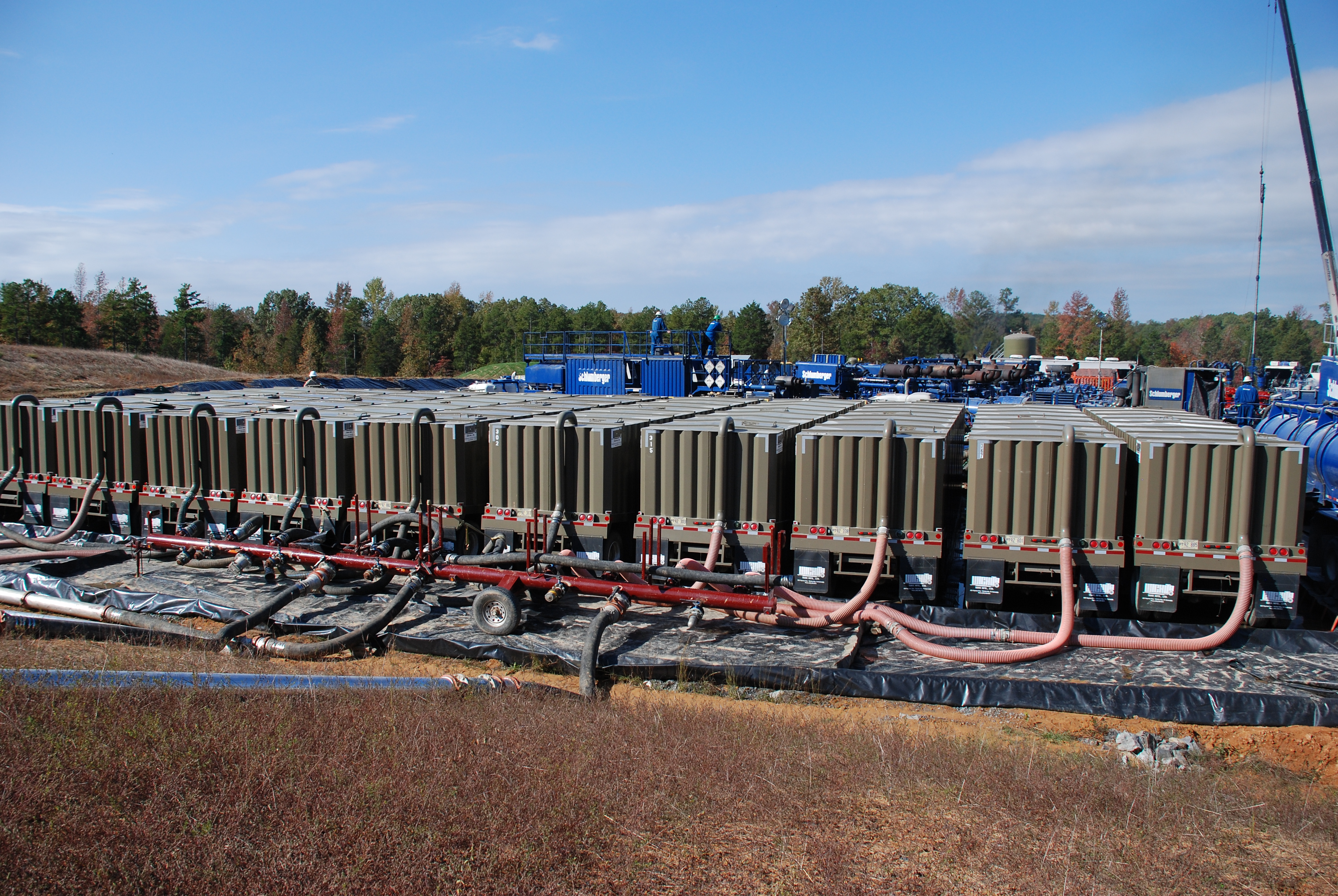 Tanks like these in the Fayetteville Shale area (Arkansas) are commonly used to supply the water required for hydraulic fracturing operations.