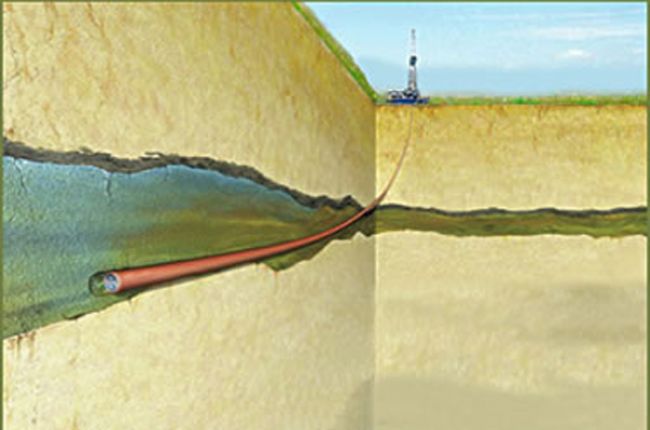 Illustration of the Frio Pilot carbon sequestration test; carbon dioxide compressed to a liquid will be pumped into a brine-saturated aquifer in the Frio Formation, a mile beneath the surface. Image Credit: Lawrence Berkeley National Laboratory