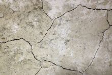 Photograph of concrete cracked by pyrrhotite breakdown