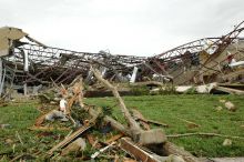 A middle school is left in a mangled heap after a June 11 F-3 tornado ripped through Chapman, Kansas. Image Credit: Photo by Anita Westervelt/FEMA