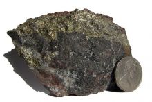 Image of ore containing chalcopyrite and uranium. Image Credit: Wikimedia user Geomartin, Licensed under Creative Commons, CC-BY-SA-3.0, http://creativecommons.org/licenses/by-sa/3.0) via Wikimedia Commons
