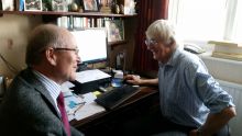 New Executive Manager Ian Davey, left, discussing handover plans with John Chilton