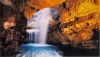 A waterfall in the interior of Smoo Cave. 