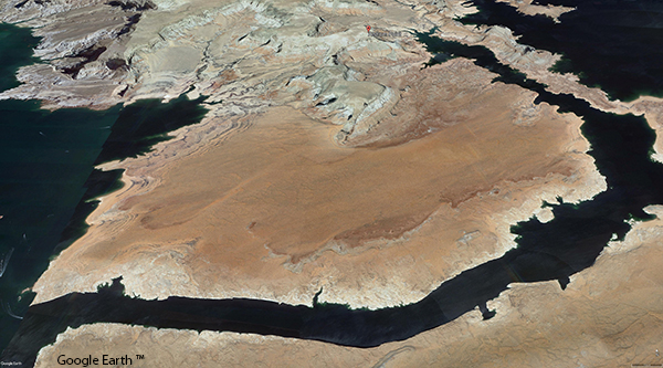 Google Earth™ aerial image of an arid peninsula surrounded by water.