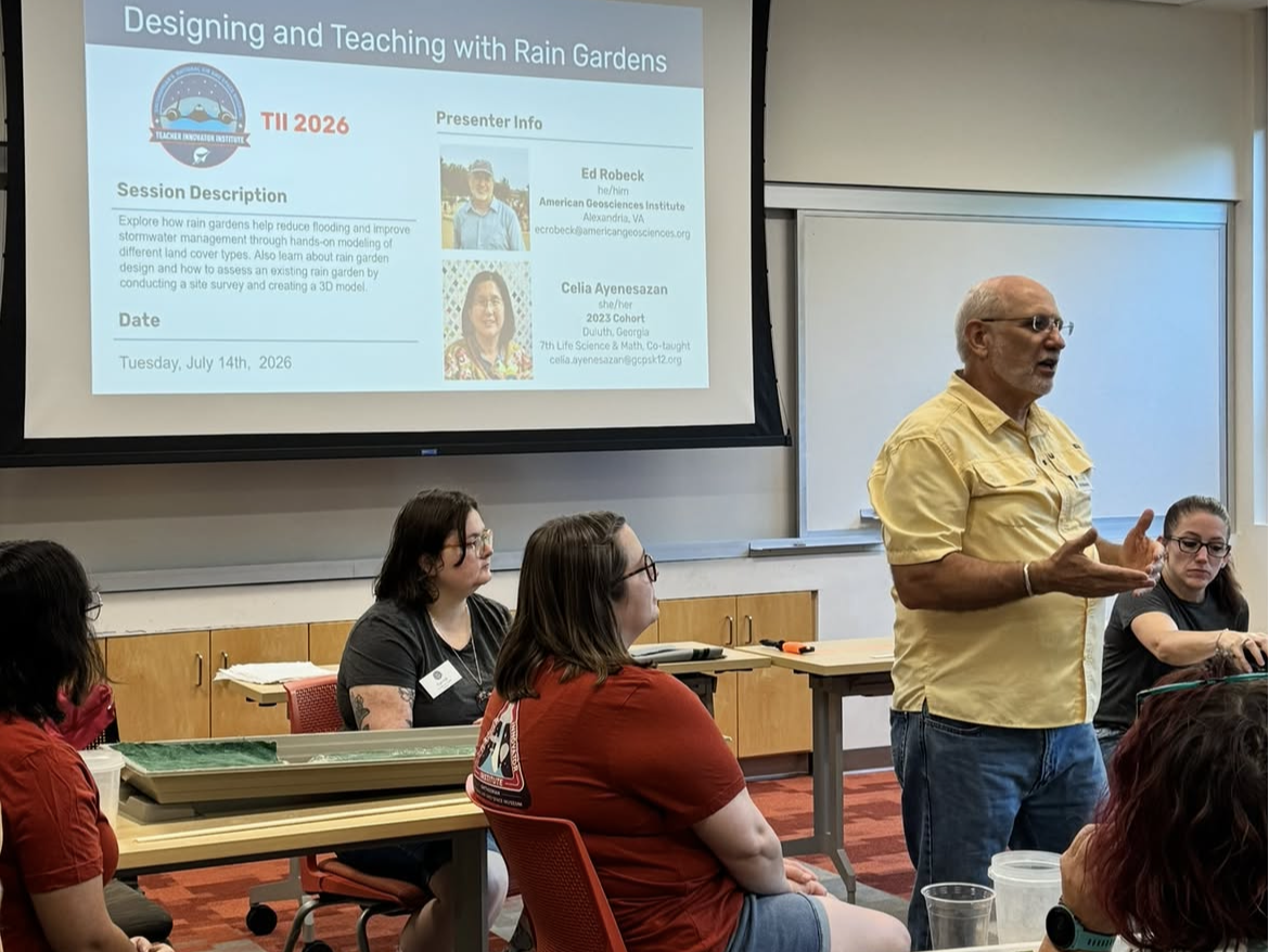 AGI department head, Ed Robeck, presenting in front of teachers