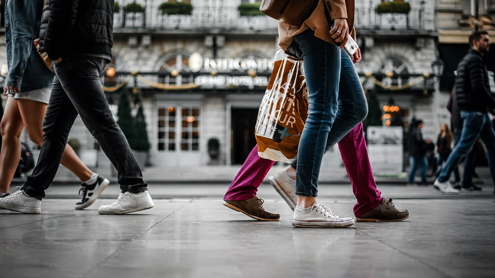 People walking along a street.