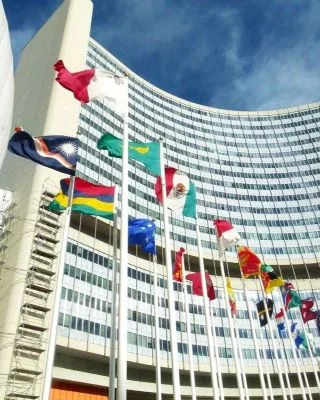 Flags representing government and policy contexts.